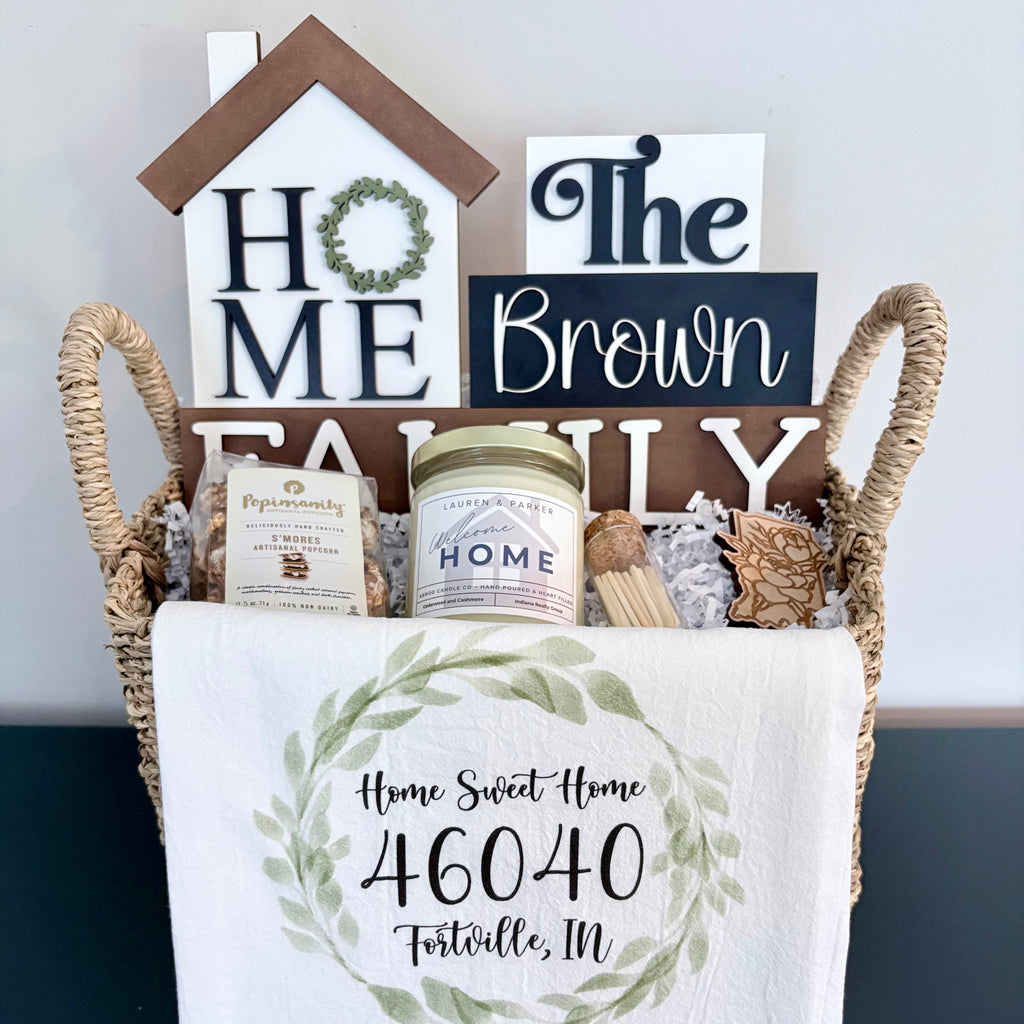 The Select closing gift basket with  locally made 'Home Sweet Home' sign, candle, and tea towel.