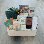 The Signature closing gifts basket by SD Gift Co including local candle, IN state sign, and engraved tumblers.
