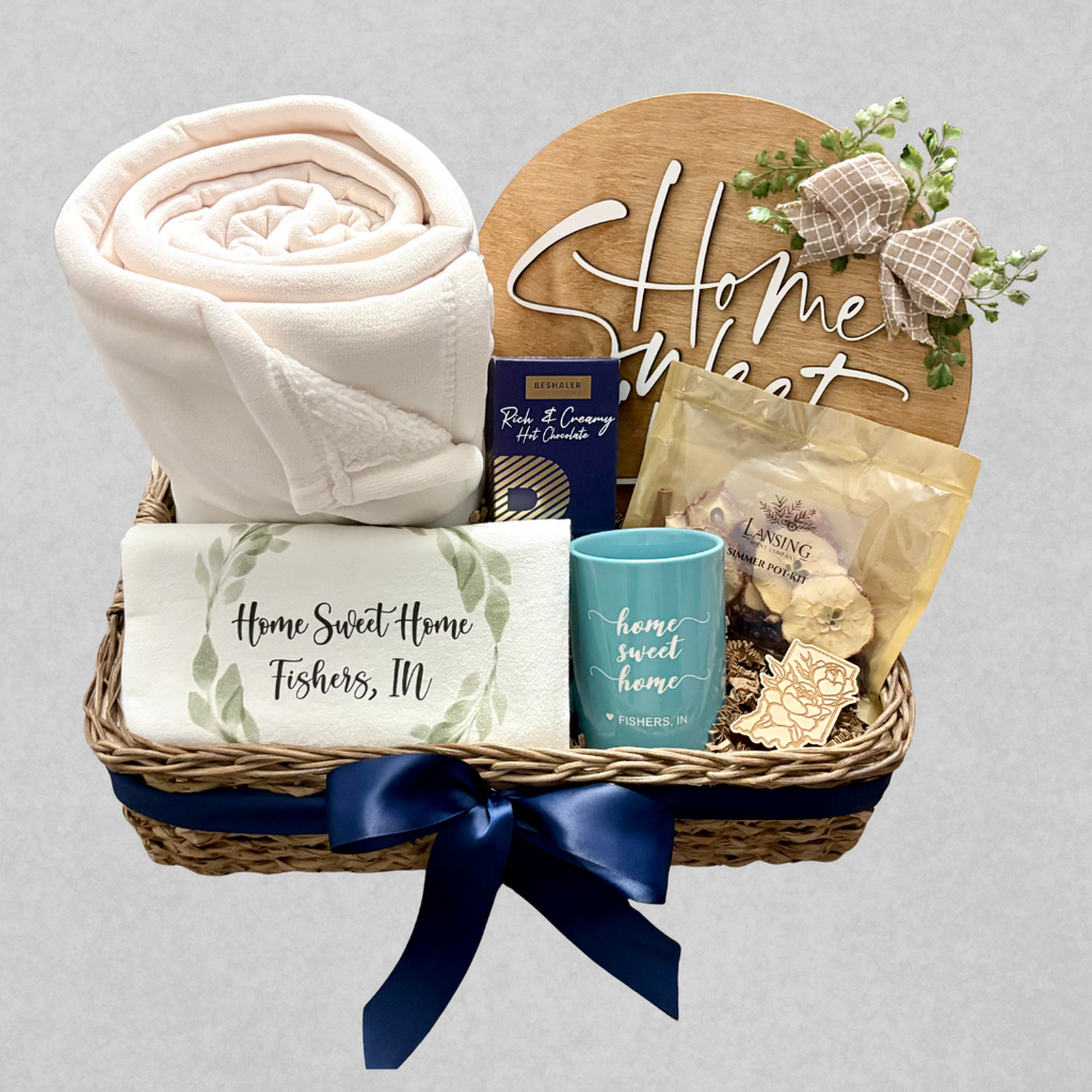 The Standard closing gift basket by SD Gift Co for Indiana realtors, including items like personalized tea towels, mugs, candles and decor.