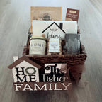 Closing gift basket with local candle, etched glass, and a custom house-shaped sign made for realtors in Indiana.