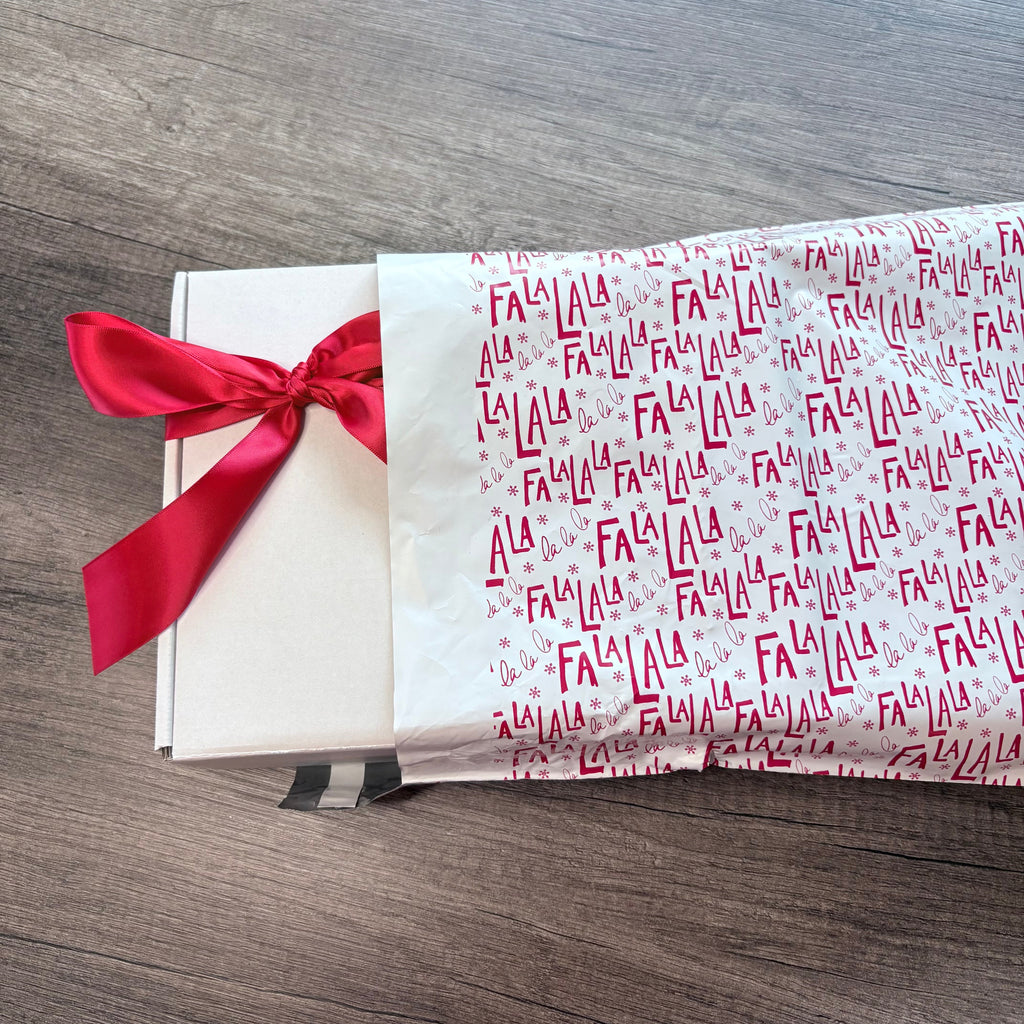 Festive holiday poly mailer for Christmas Connection boxes sent from SD Gift Co.