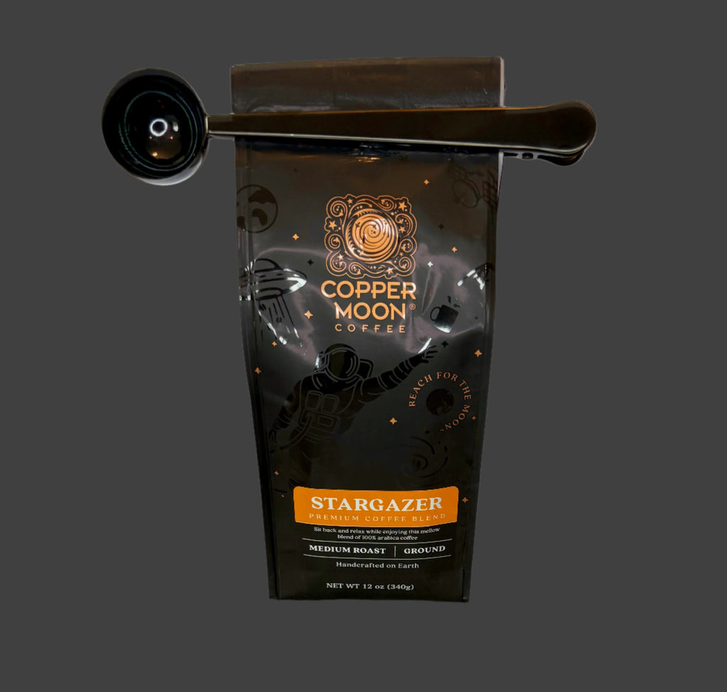 Copper Moon Coffee Stargazer package with a scoop on a table