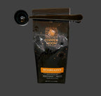 Copper Moon Coffee Stargazer package with a scoop on a table