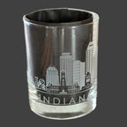Rocks gass with Indianapolis city scape engraving on a wooden surface