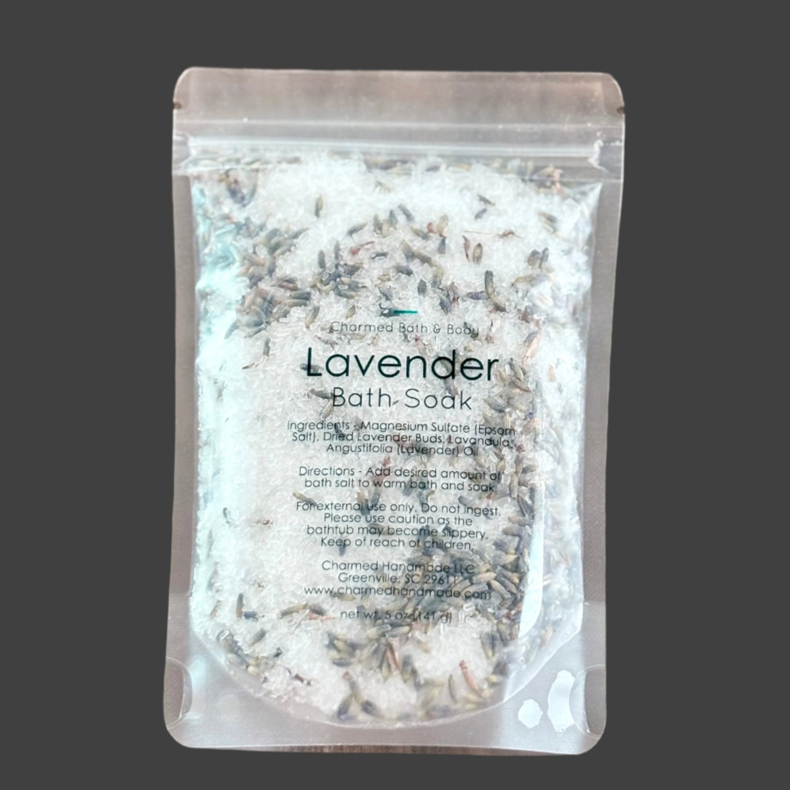 Lavender bath soak package on a wooden surface